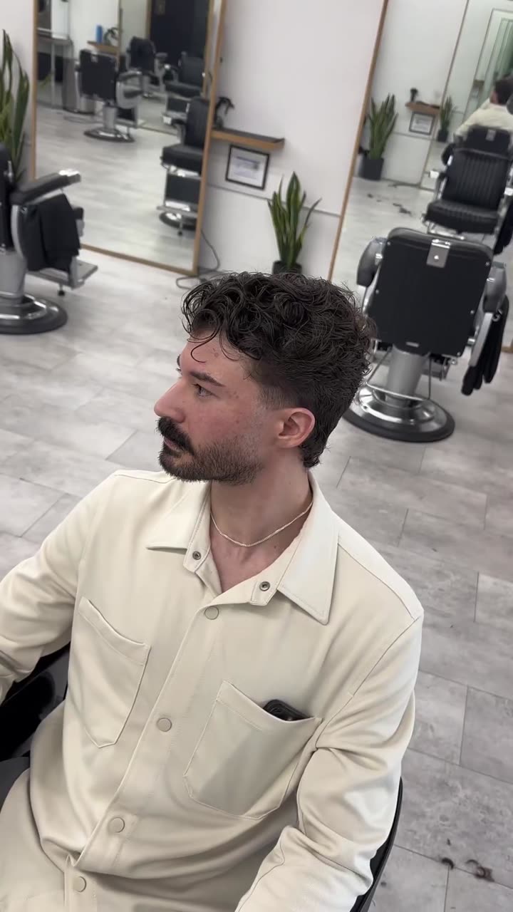 Curly men&rsquo;s haircut by Marvin Barber at Star Barber Co., Greenville SC