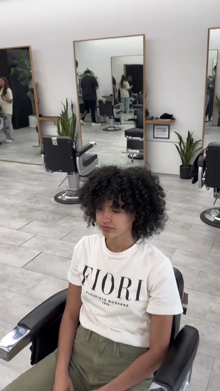Tailored cut on tight curls by Marvin Barber, Greenville SC